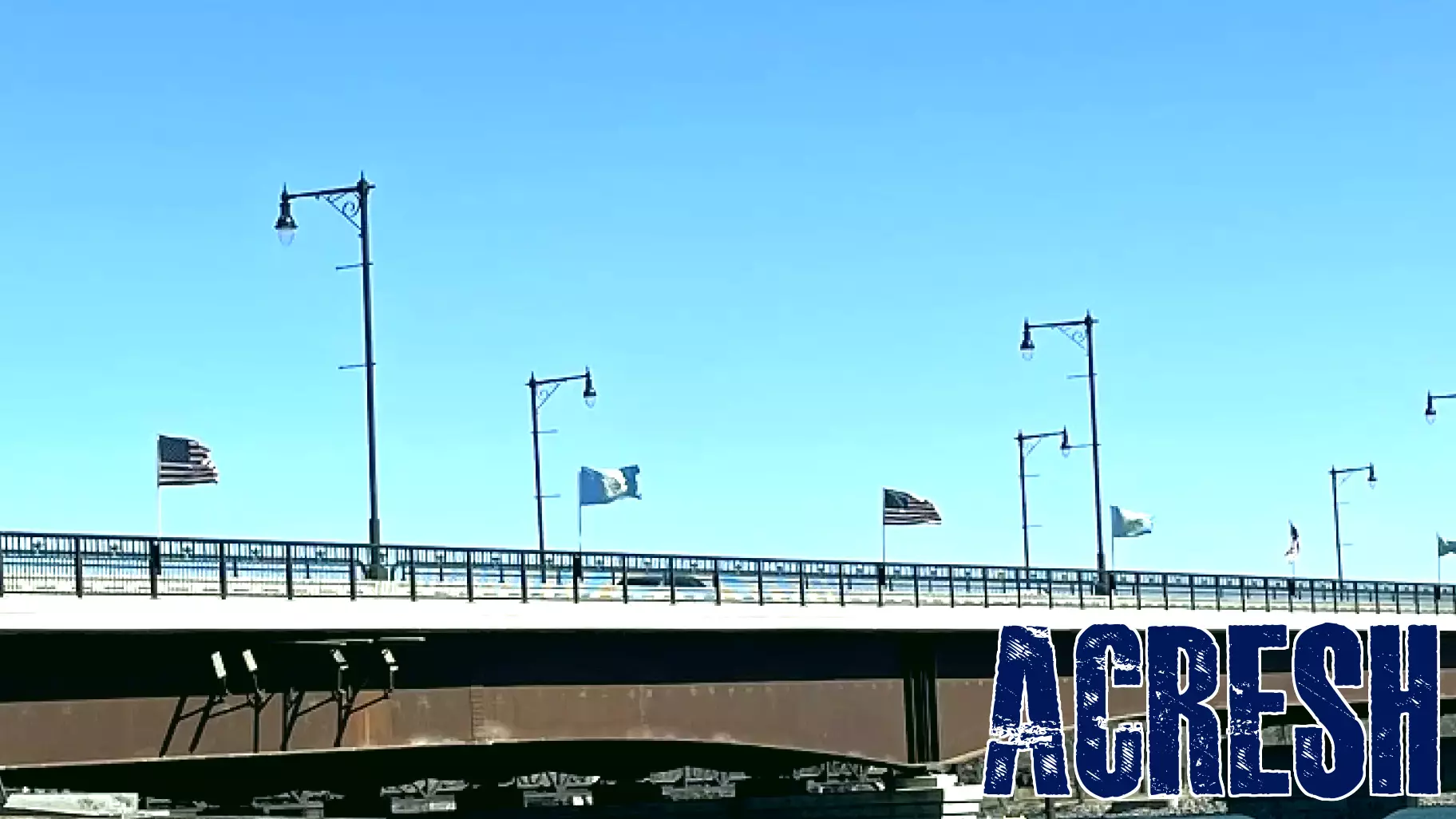 Acrisure / Fischer Rounds Real Estate sponsors the Flags Across the Bridge in Observance of 250th Independence Day
